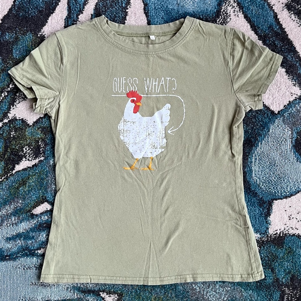 Guess What? Chicken Butt.  Super cute chicken Tee size Small